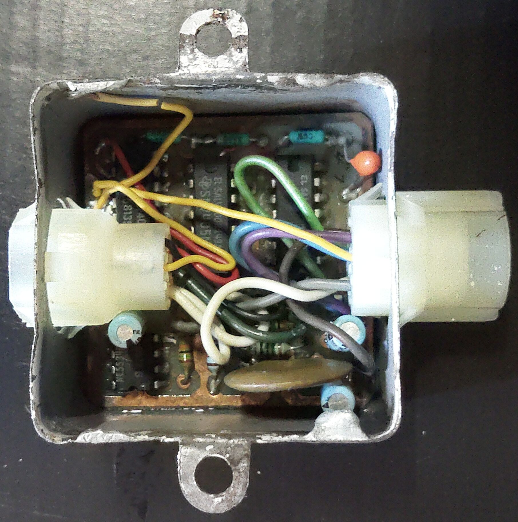 Original single-microphone TTL ASSM unit inside its metal enclosure